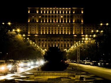 Bucharest, Romania. Iconic Palace of the Parliament surrounded by modern architecture.