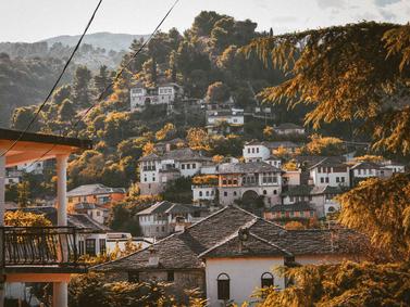 Gjirokaster, Albania. Historic town with traditional stone houses and terracotta roofs.