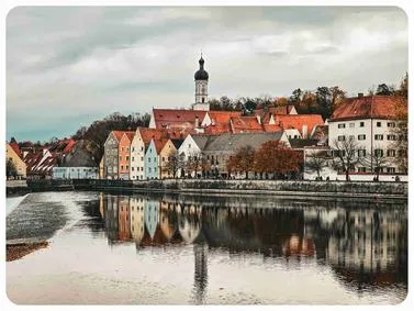 Landsberg am Lech Travel Guide: Historic colorful houses and the iconic Lechwehr waterfall.