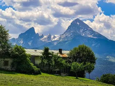 Majestic mountain landscape with rugged peaks against a vibrant sky, showcasing the grandeur of nature.