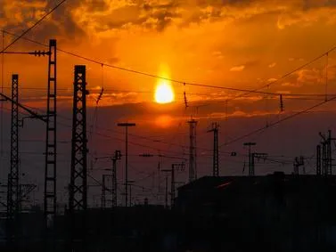 Breathtaking sunset with the sky painted in hues of orange, pink, and purple, casting a warm glow over the landscape.