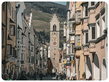 The iconic Zwölferturm tower in colorful Vipiteno - View gallery of Italy's northernmost Alpine town.