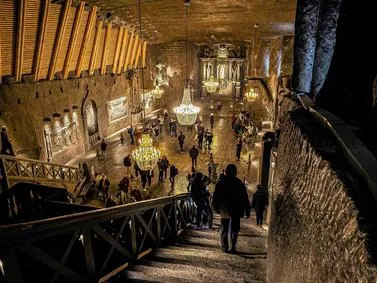 Wieliczka Salt Mine Travel Guide: Historic salt mine featuring intricate carved chambers and statues.